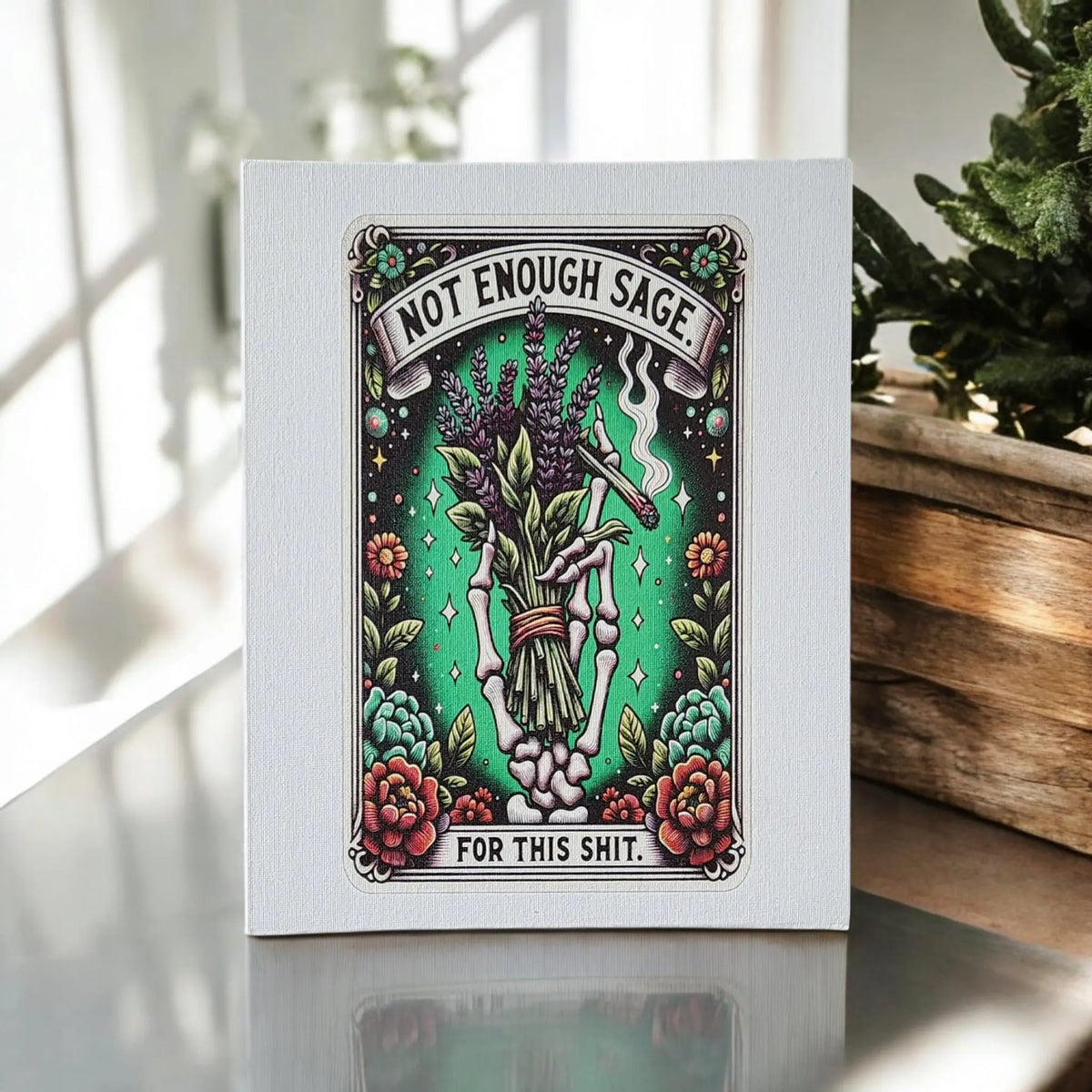 The Mirabilia Boutique Not Enough Sage Canvas Print (8x10) features a skeleton hand holding sage with flowers and leaves, plus the phrase “Not enough sage for this shit.” A perfect piece of sarcastic spiritual decor for any witchy space.