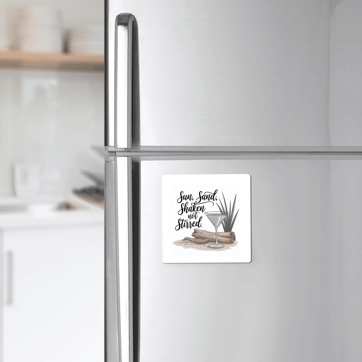The Sun, Sand, Shaken Not Stirred Magnet by Mirabilia Boutique adds a touch of coastal charm and cocktail-inspired decor to your kitchen.