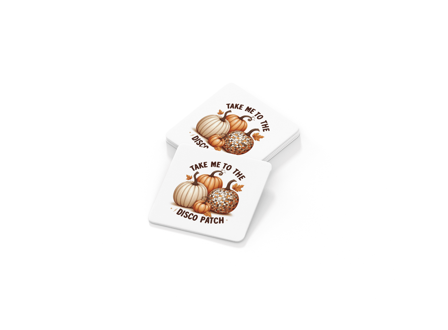 The Disco Patch Pumpkin Coaster Set by Mirabilia Boutique features two square coasters with pumpkins and disco balls plus "Take me to the disco patch" in retro style—perfect fall decor for parties or entertaining.