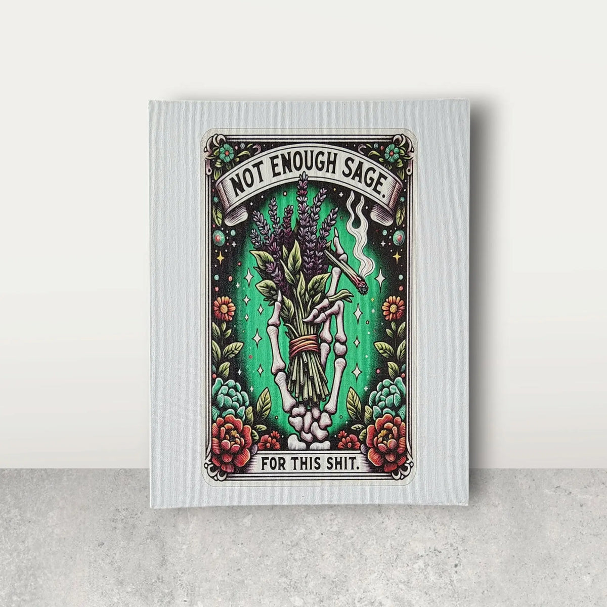 Mirabilia Boutique’s Not Enough Sage Canvas Print (8x10) features a skeleton hand holding sage and lavender, surrounded by stars and flowers, with “NOT ENOUGH SAGE” above and “FOR THIS SHIT” below. Perfect witchy, dark humor wall art.