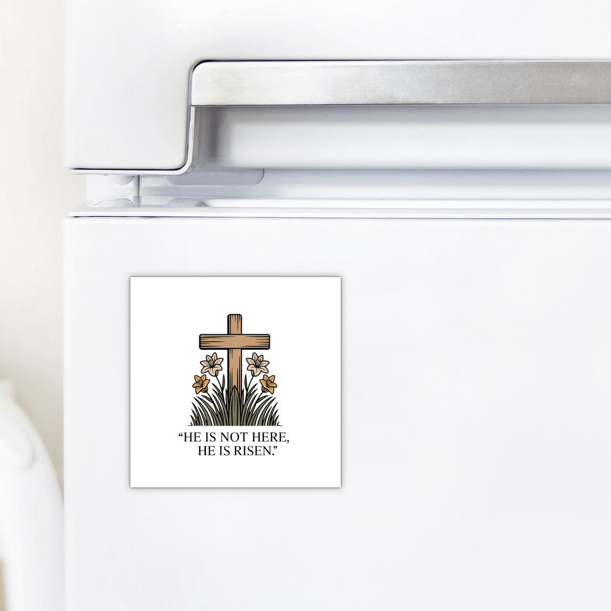The Mirabilia Boutique "He Is Risen Easter Magnet – Cross & Lily Scripture Art" features a wooden cross, lilies, and scripture: “He is not here, He is risen.” A perfect faith gift to inspire hope each day.