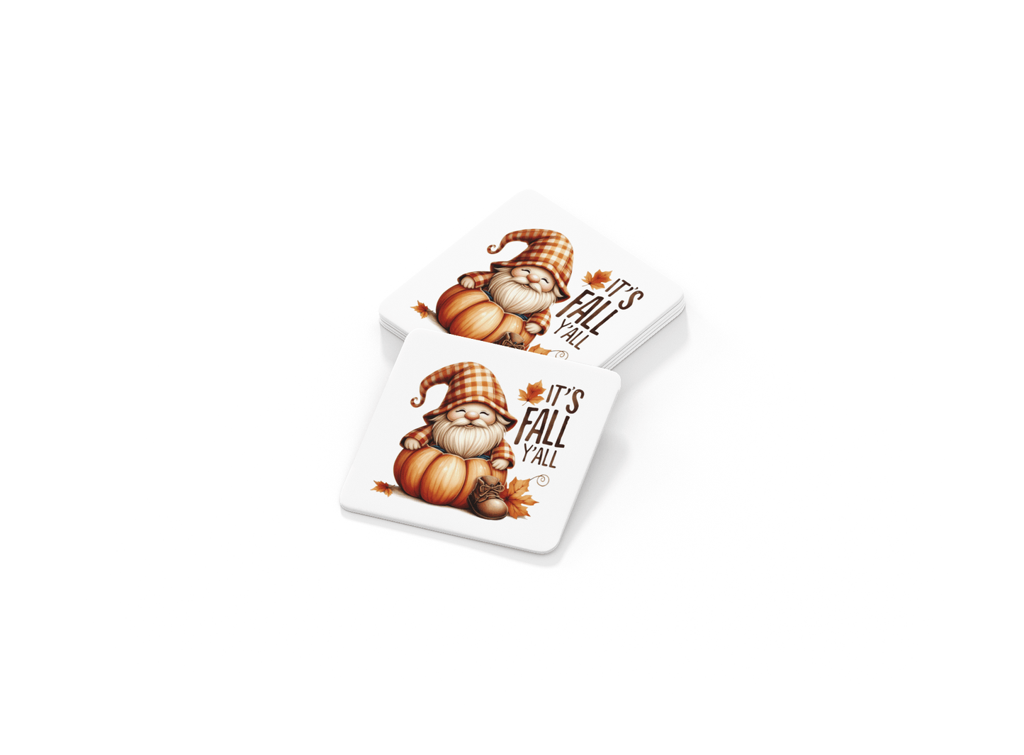 The Fall Gnome Coasters Set by Mirabilia Boutique features two square coasters with a gnome in an orange hat, pumpkins, autumn leaves, and "It's Fall Y'all"—a charming touch for your fall home decor.
