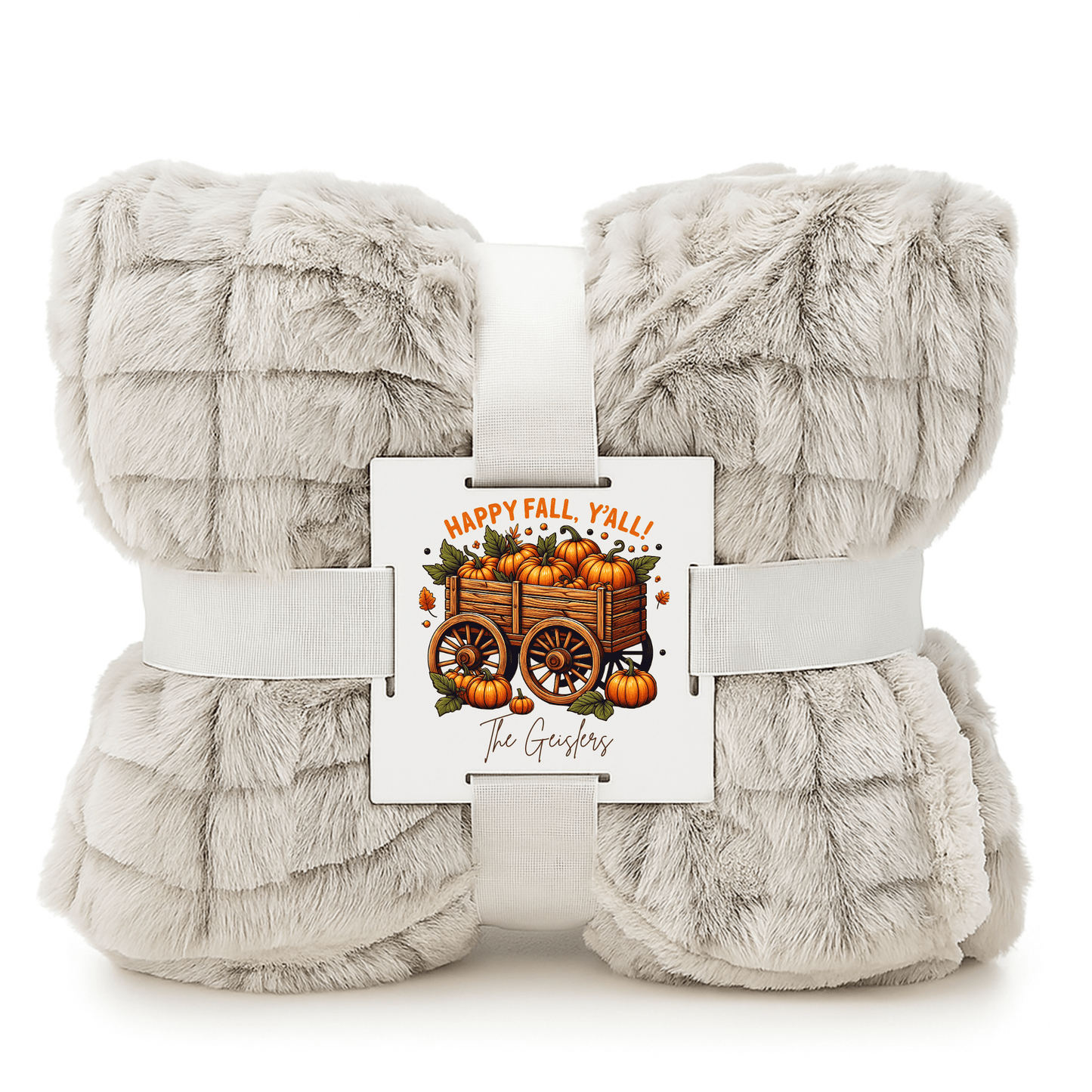 The Mirabilia Boutique Custom Fall Throw Blanket, a soft light gray faux fur, comes folded with a white ribbon and card reading "Happy Fall, Y'all!" and "The Goshers"—a cozy autumn gift for any home.