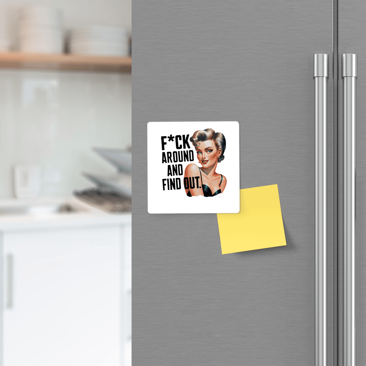 A Mirabilia Boutique F*ck Around and Find Out Retro 3x3 UV Printed Magnet, featuring bold pinup art and text, is displayed on a fridge door beside a blank yellow sticky note. A quirky gift for friends, coworkers, or office desks.