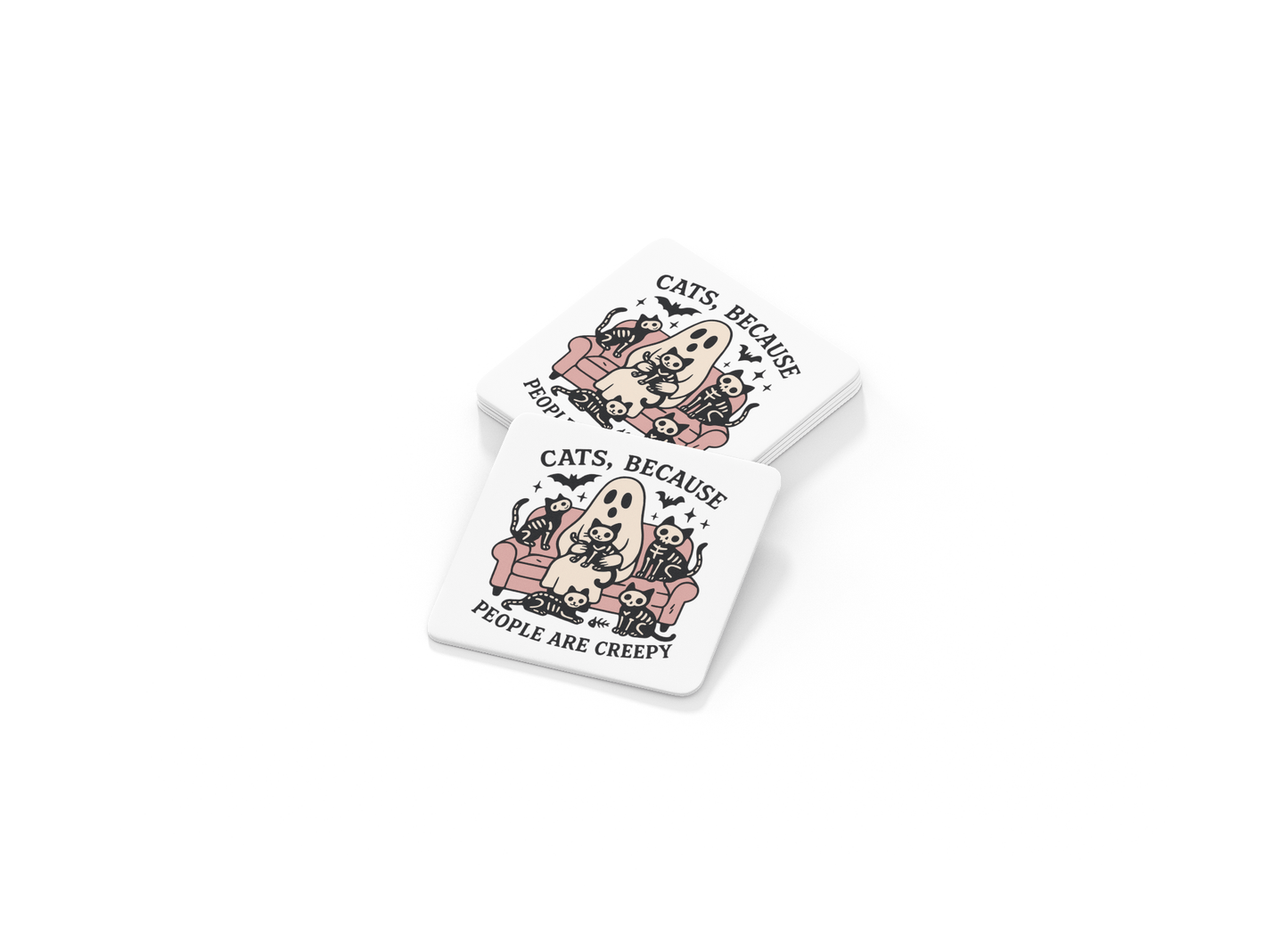 The Funny Ghost Cat Coaster by Mirabilia Boutique features a ghost on a pink couch with cats and the phrase "Cats Because People Are Creepy"—a quirky, gothic gift for cat lovers or fans of cute, creepy decor.