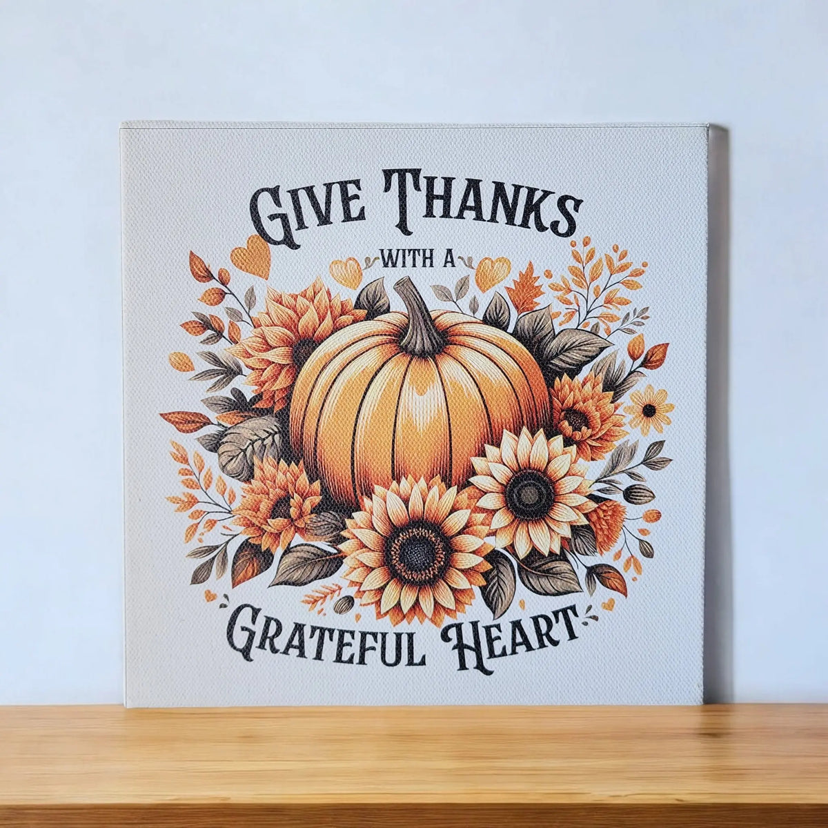 Mirabilia Boutique’s “Give Thanks With a Grateful Heart” 8x8 wood sign features a rustic pumpkin and sunflower design, UV printed on cradled wood. Ideal Thanksgiving décor for your home or office wall.