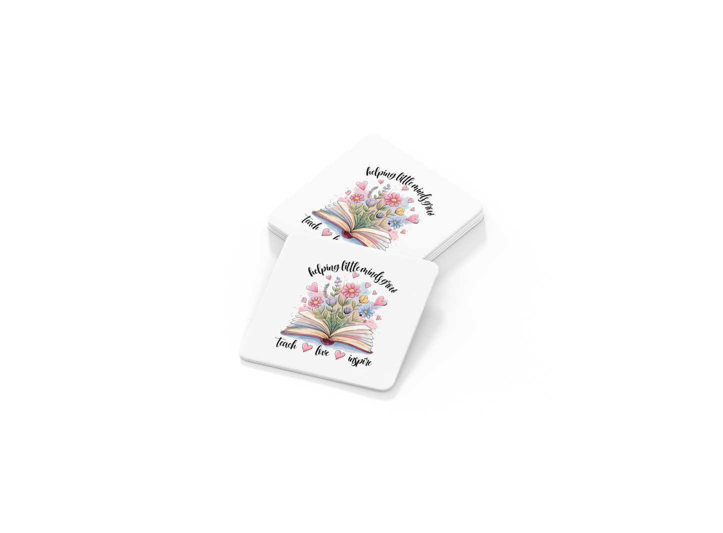 Set of 4 white coasters from Mirabilia Boutique featuring an open book, colorful flowers, and butterflies with "Helping Little Minds Grow"—a thoughtful teacher gift.