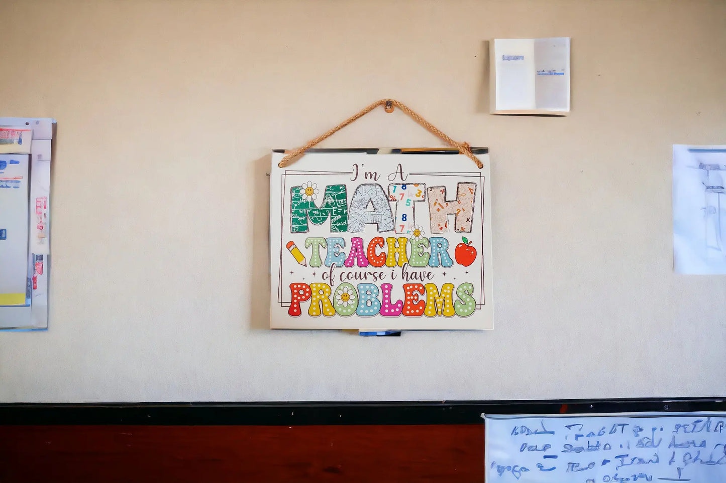 The Mirabilia Boutique Funny Math Teacher Classroom Sign, reading "I'm A Math Teacher Of Course I Have Problems," features colorful lettering and math graphics—perfect wall décor for any classroom or teacher's door.
