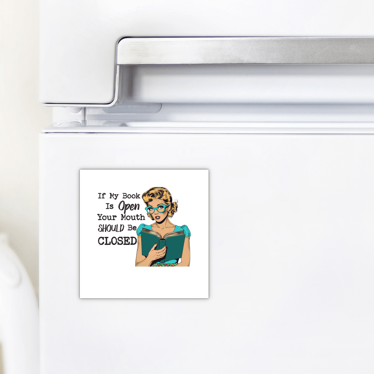 The Book Lover Magnet by Mirabilia Boutique features retro art and the quote “If My Book Is Open” on a UV printed 3x3 magnet—a funny gift for readers and introverts who appreciate witty decor.