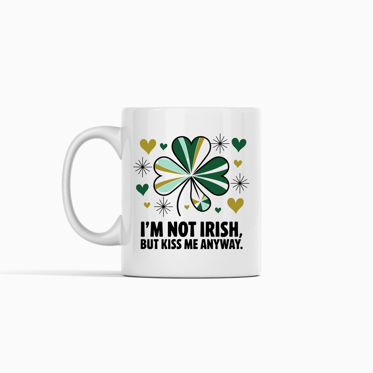 The Kiss Me Anyway Mug – St. Patrick’s Day Charm by Mirabilia Boutique features a green, gold, and black shamrock design with hearts, sparkles, and “I’m not Irish, but kiss me anyway”—perfect for celebrating your lucky side!.