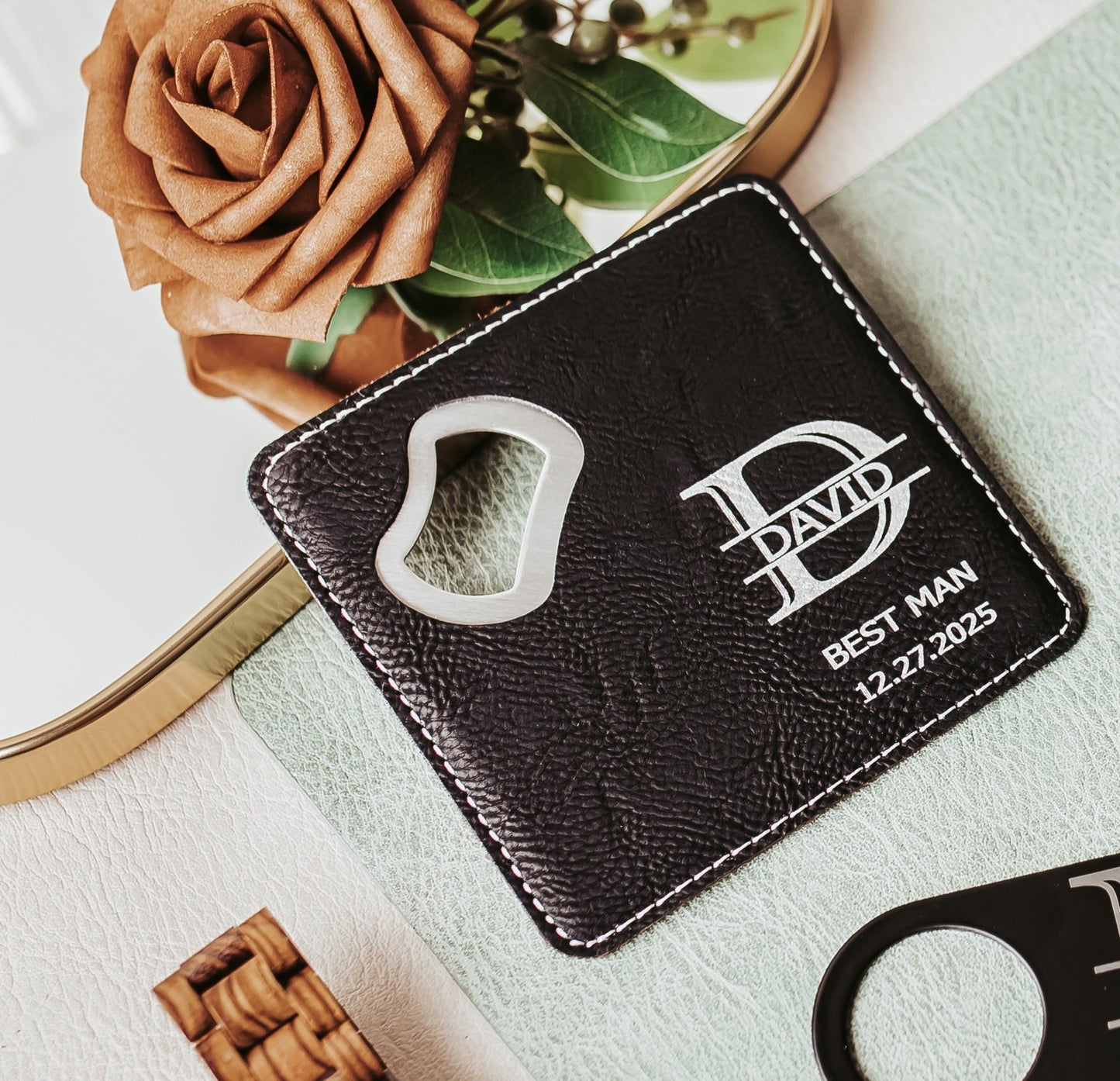 The Mirabilia Boutique Personalized Best Man Flask Gift Set, customized with "David," "Best Man," and "12.27.2025," is shown with a brown paper rose and decor—an ideal groomsmen present.