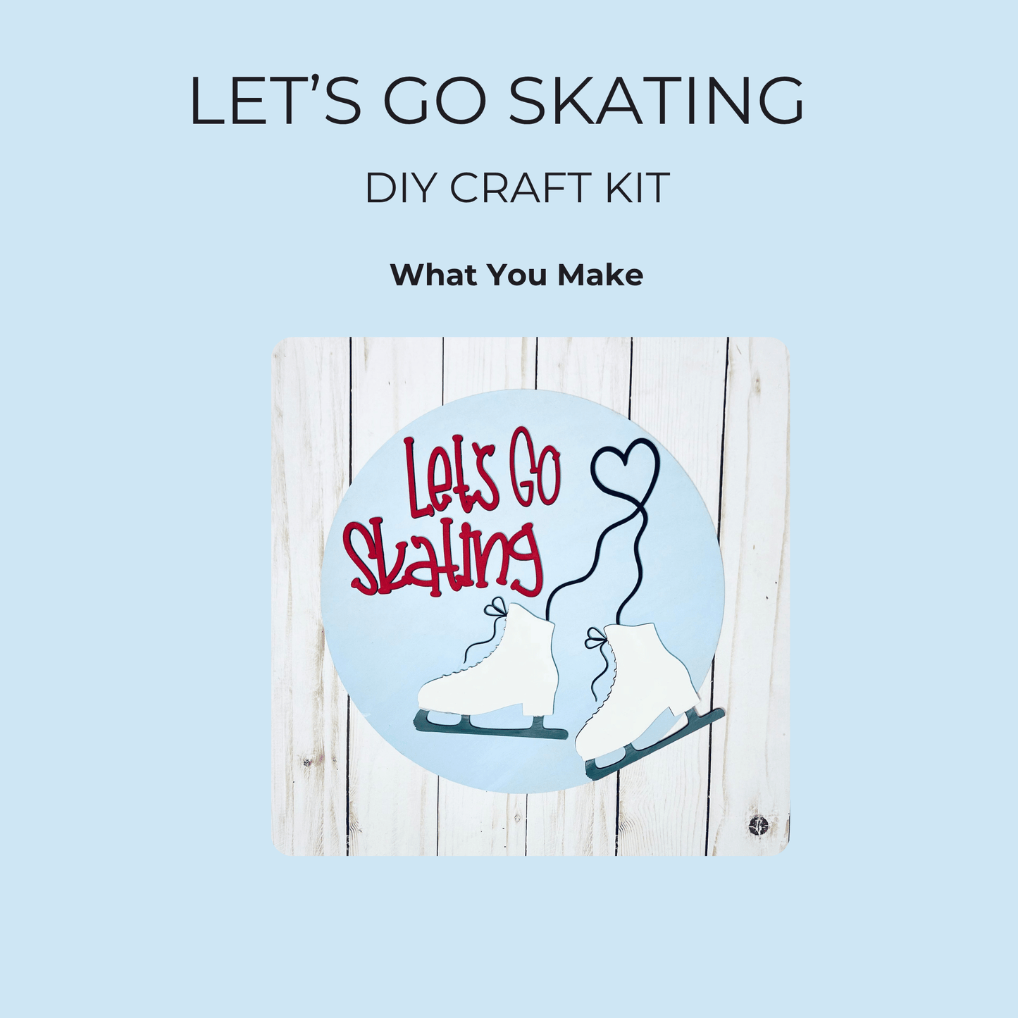 The Let’s Go Skating DIY Paint Kit by Mirabilia Boutique features ice skates, red "Let's Go Skating" text, and a heart-shaped lace on a round blue layered wood sign—perfect winter decor for your craft projects.