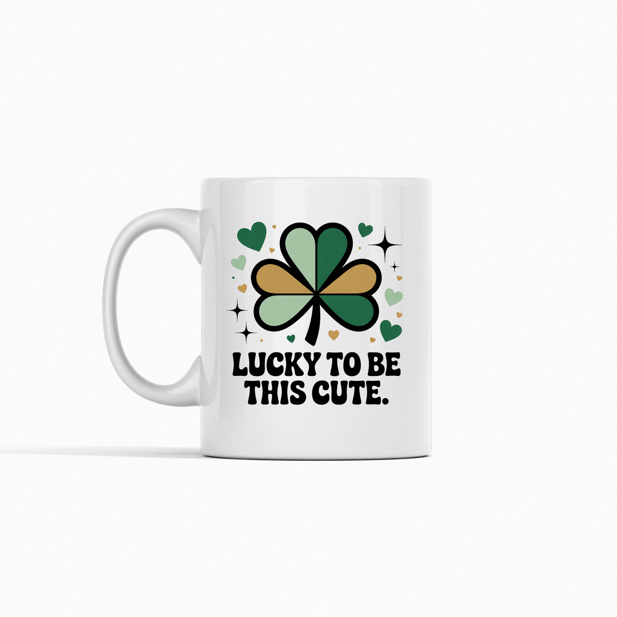 The Lucky to Be This Cute Shamrock Mug by Mirabilia Boutique features a green and gold shamrock, hearts, sparkles, and the phrase "Lucky to be this cute."—a charming self-love mug and perfect gift.