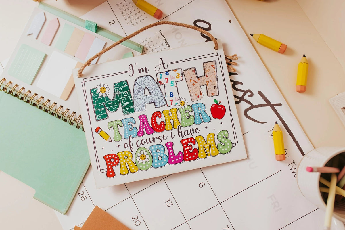 The Mirabilia Boutique Funny Math Teacher Classroom Sign reads "I'm A Math Teacher Of Course I Have Problems," featuring colorful decor—perfect as a teacher appreciation gift for desks, doors, or walls.