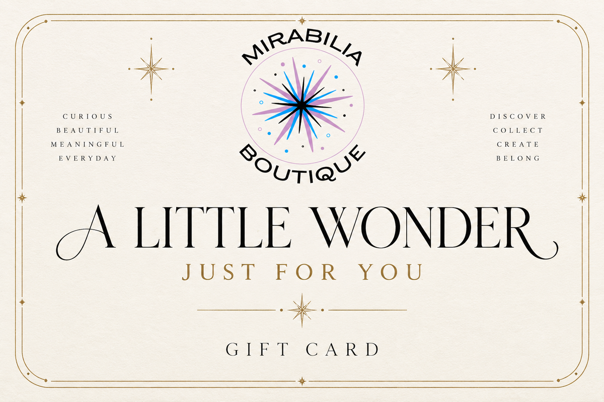 Give the gift of discovery with the Mirabilia Gift Card | A Little Wonder, Just for You from Mirabilia Boutique. Adorned with a signature starburst logo and elegant borders, this gift card features uplifting phrases such as “A Little Wonder Just For You” and “Curious, Beautiful, Meaningful, Everyday.” It’s the perfect way to celebrate life’s little wonders—share joy with Mirabilia Boutique today.