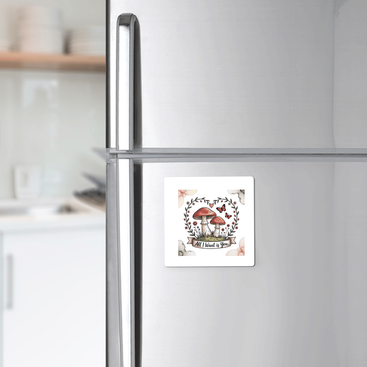 The Mushroom Love Magnet by Mirabilia Boutique features a charming nature design with heart-shaped wreath, making it a cute fridge decor piece—ideal for cottagecore style or as a thoughtful gift.