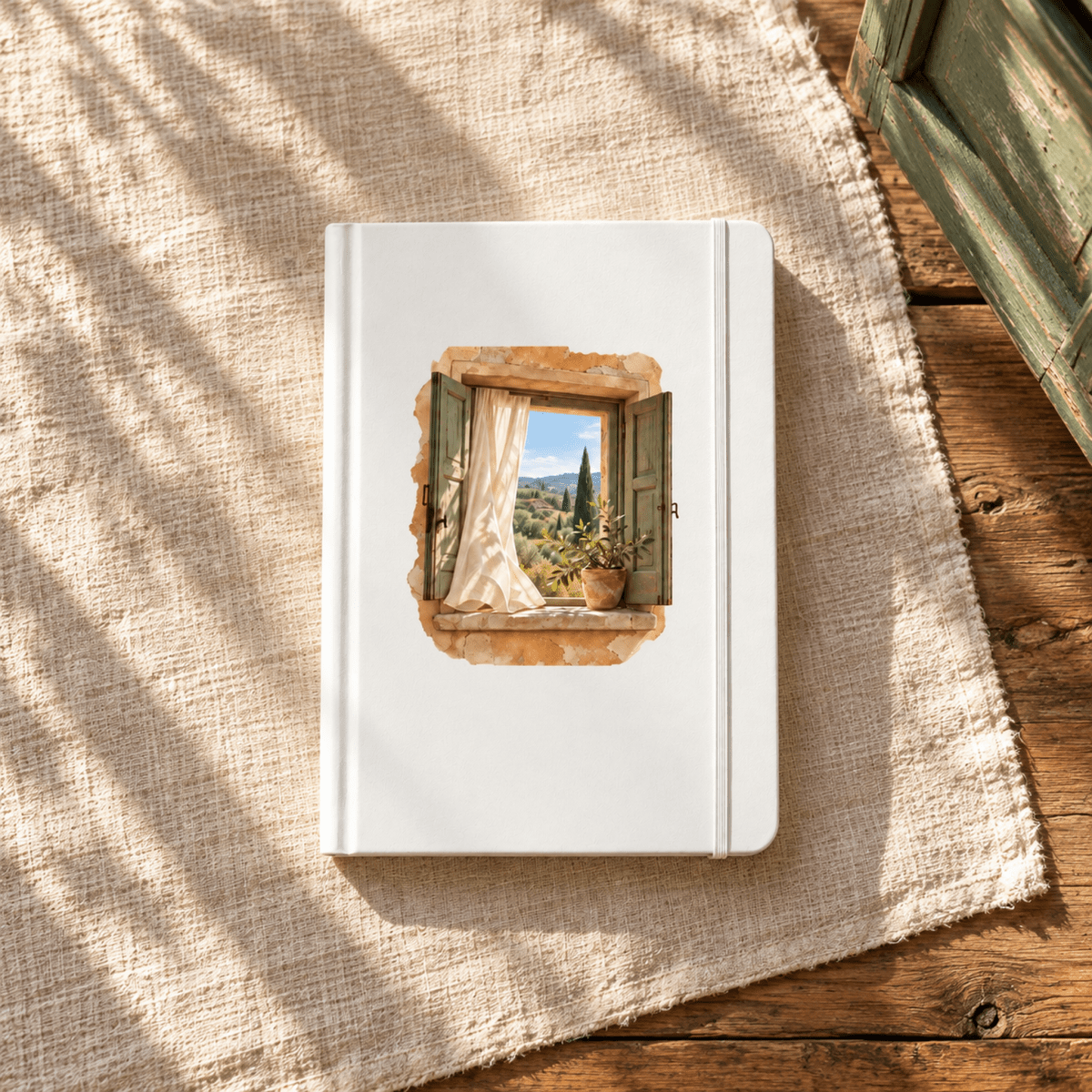 Days Still Becoming A5 Journal | Ochre & Cypress: a white A5 lined journal featuring an illustration of an open window overlooking a Tuscan countryside landscape.