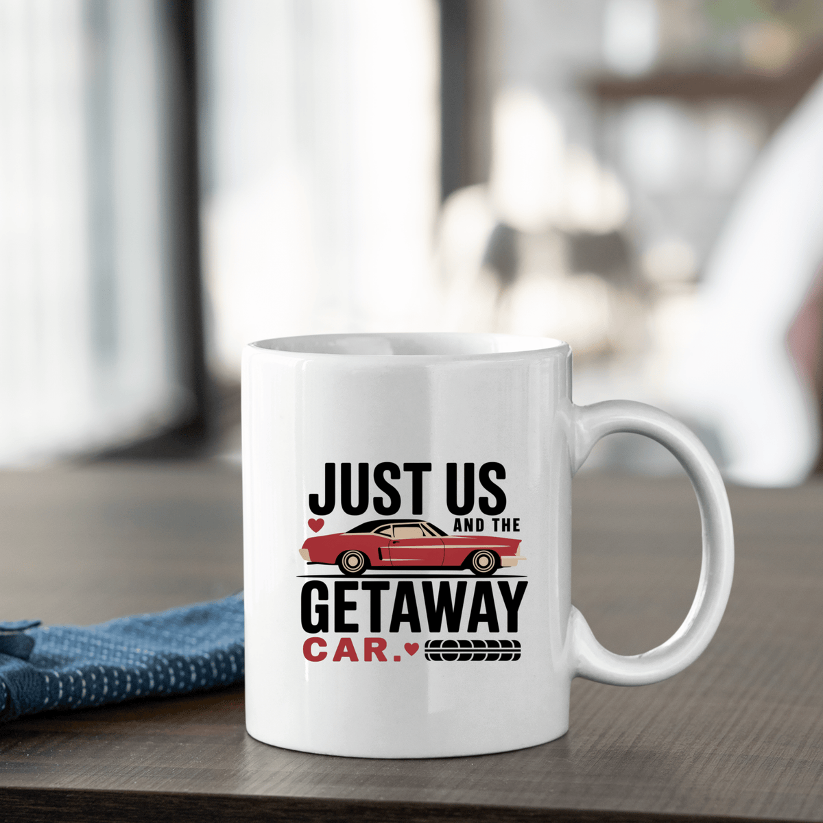 The Romantic Getaway Car Mug by Mirabilia Boutique features “Just us and the getaway car” beside a red car and tire mark, making it a charming, funny couples gift and perfect for romantic moments.