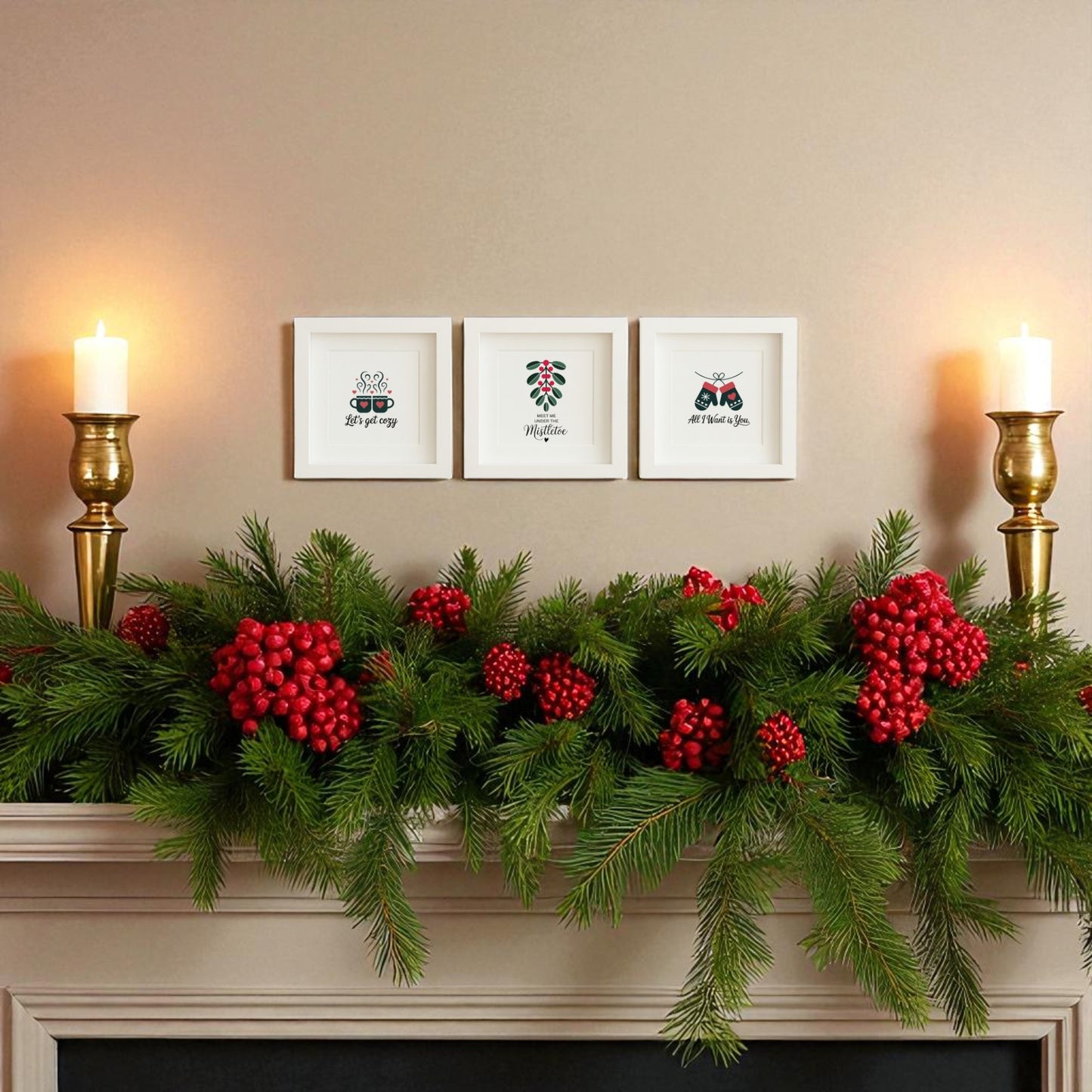 A mantel adorned with pine branches, red berries, and gold candle holders sits beneath the Mirabilia Boutique Romantic Holiday Wall Art Trio 5x5 Framed Gift Set, creating cozy holiday decor for couples.
