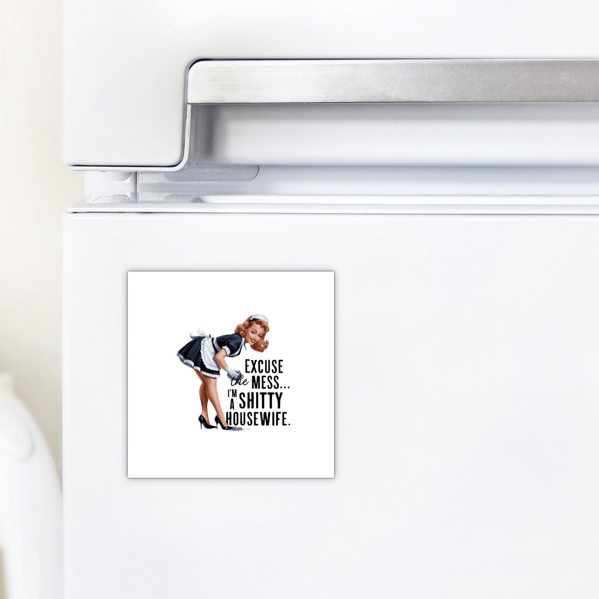 The Mirabilia Boutique “Excuse the Mess Magnet” is a funny 3x3 retro fridge magnet UV printed with “I’m a Sh*tty Housewife”—a cheeky, vintage-style gift or unique kitchen decoration.