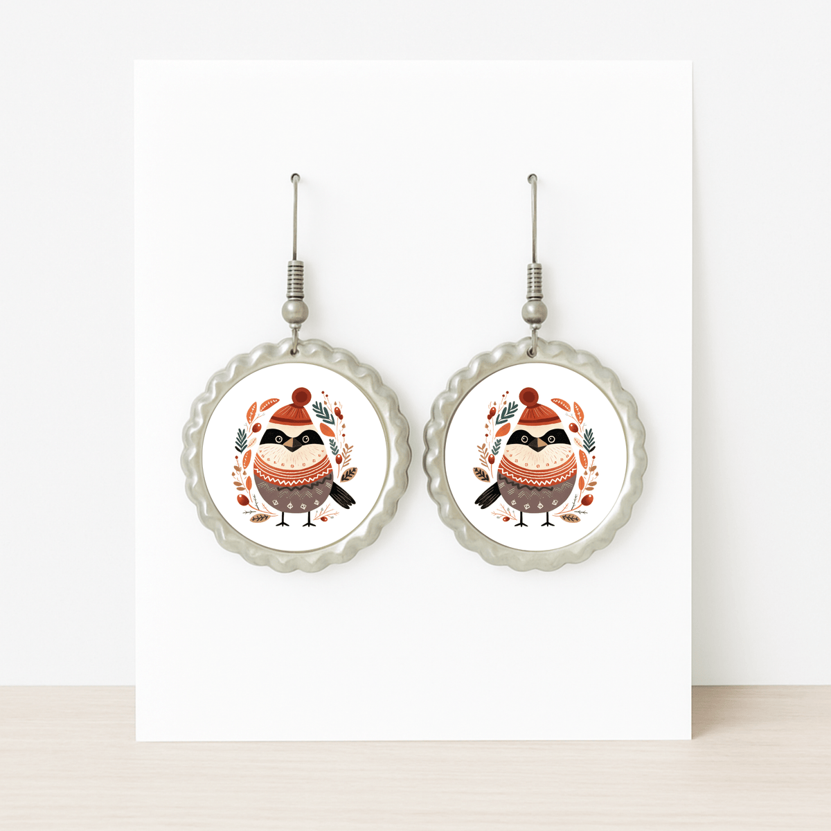 Mirabilia Boutique’s Scandi Christmas Bird Earrings feature hypoallergenic round studs with a festive bird and autumn leaves—a perfect hygge holiday accessory for fans of Scandinavian winter style.
