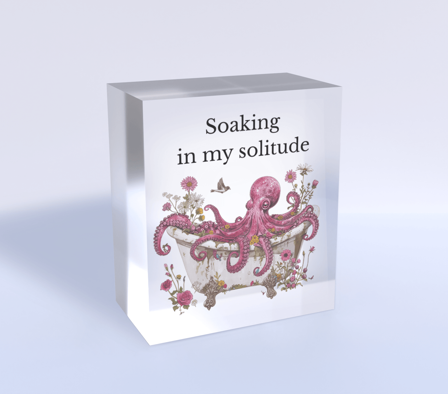 The Soaking in My Solitude Art Block by Mirabilia Boutique features a whimsical purple octopus in a bathtub with floral accents and the phrase "Soaking in my solitude"—a charming decor piece for anyone who cherishes alone time.