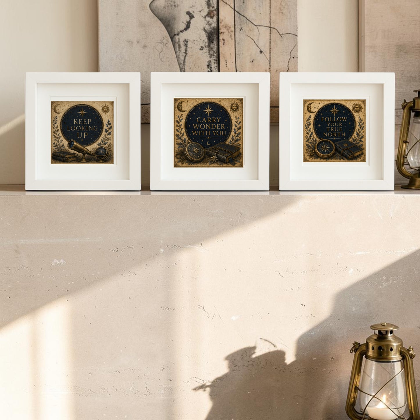 Three framed prints from Mirabilia Boutique’s “Guided by the Stars | Mirabilia Relics” collection rest on a beige mantel, each showcasing celestial artwork paired with inspirational quotes: “Keep looking up,” “Carry wonder with you,” and “Follow the north.” Lamps and additional art accentuate the display, creating a curated gallery of collectible canvas art for admirers.