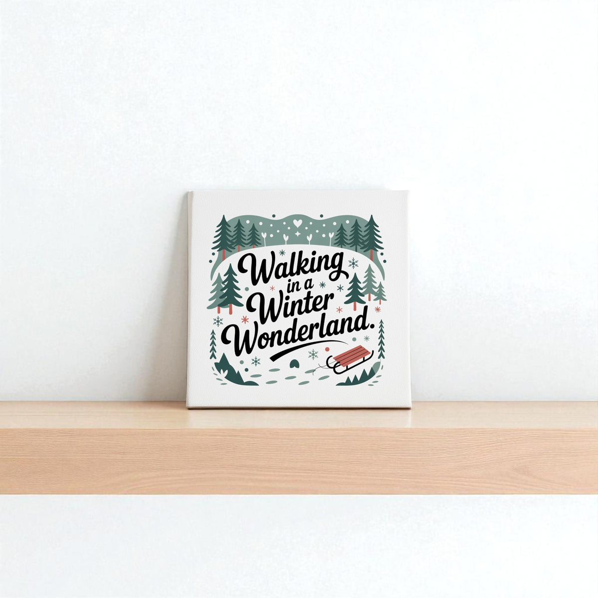 The Winter Wonderland Canvas (8x8) by Mirabilia Boutique features festive trees, snowflakes, and a red sled on a minimalist white background—perfect holiday decor to add seasonal charm to your shelf or wall.