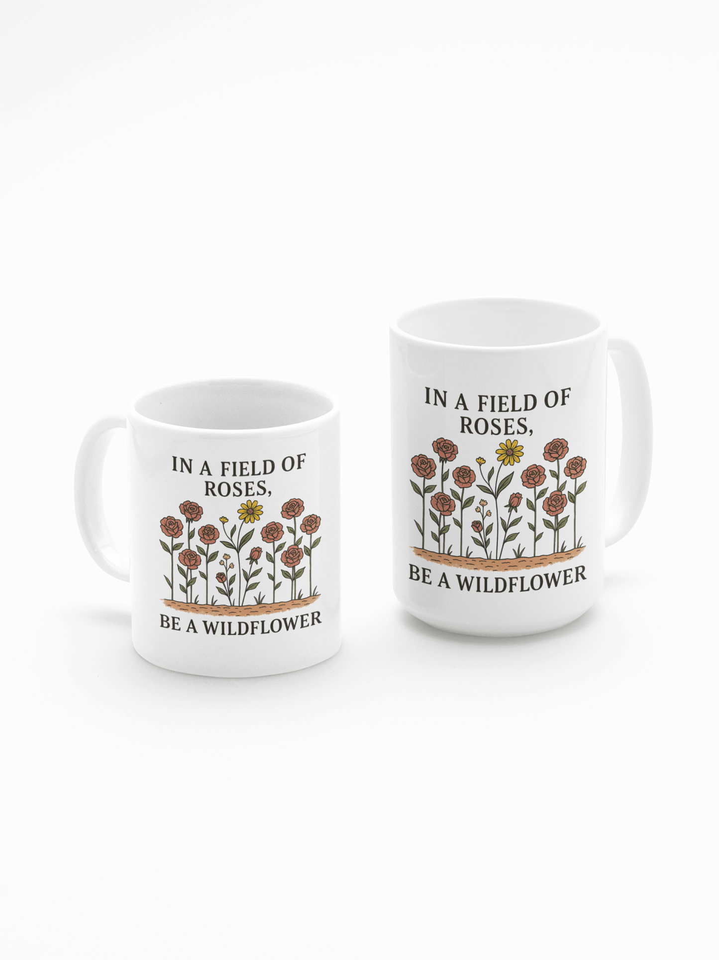 The Be a Wildflower Mug by Mirabilia Boutique is a white ceramic coffee cup featuring colorful wildflower illustrations and the phrase "In a field of roses, be a wildflower"—an inspirational and charming floral design.