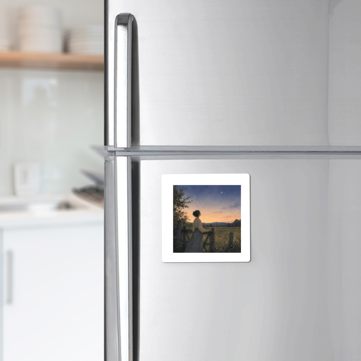 The Wonder, Always Twilight Landscape Magnet | Nature Art by Mirabilia Boutique from the Star & Solstice Collection is displayed on a silver refrigerator, featuring a person standing by a fence at sunset with trees, hints of a wildflower meadow, and a colorful sky in the background.