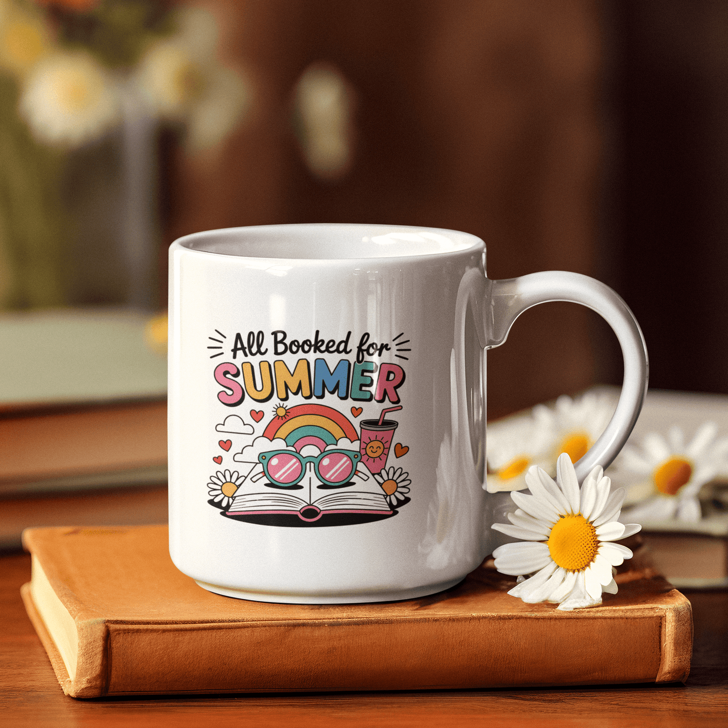 A white mug with a retro-style illustration of a woman in sunglasses and a headscarf, with the text: "Born Free But now I'm Expensive." Steam rises from the mug, sitting on a wooden table.
