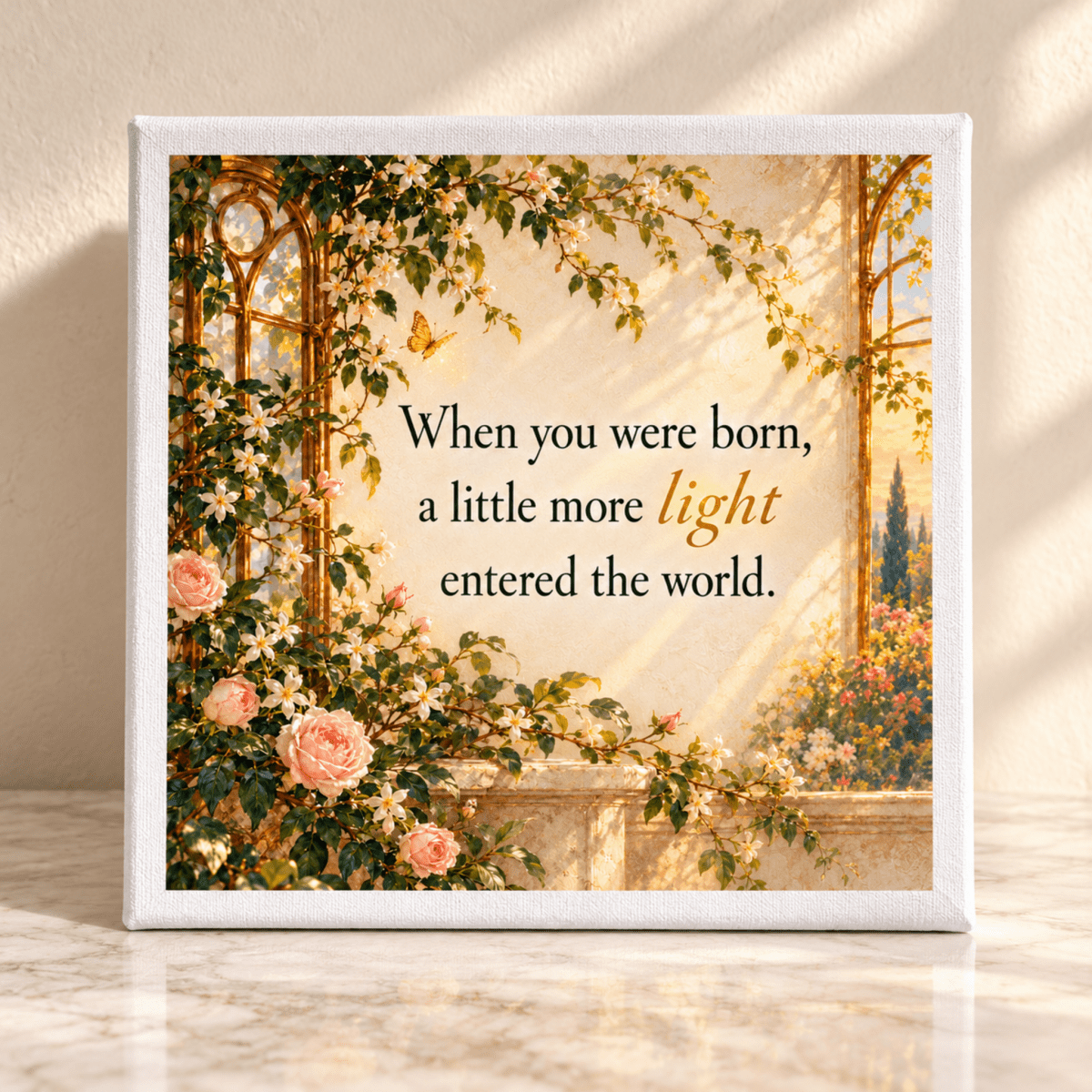 A Little More Light Canvas features climbing roses framing a stone archway with the text “When you were born, a little more light entered the world,” creating botanical wall decor.