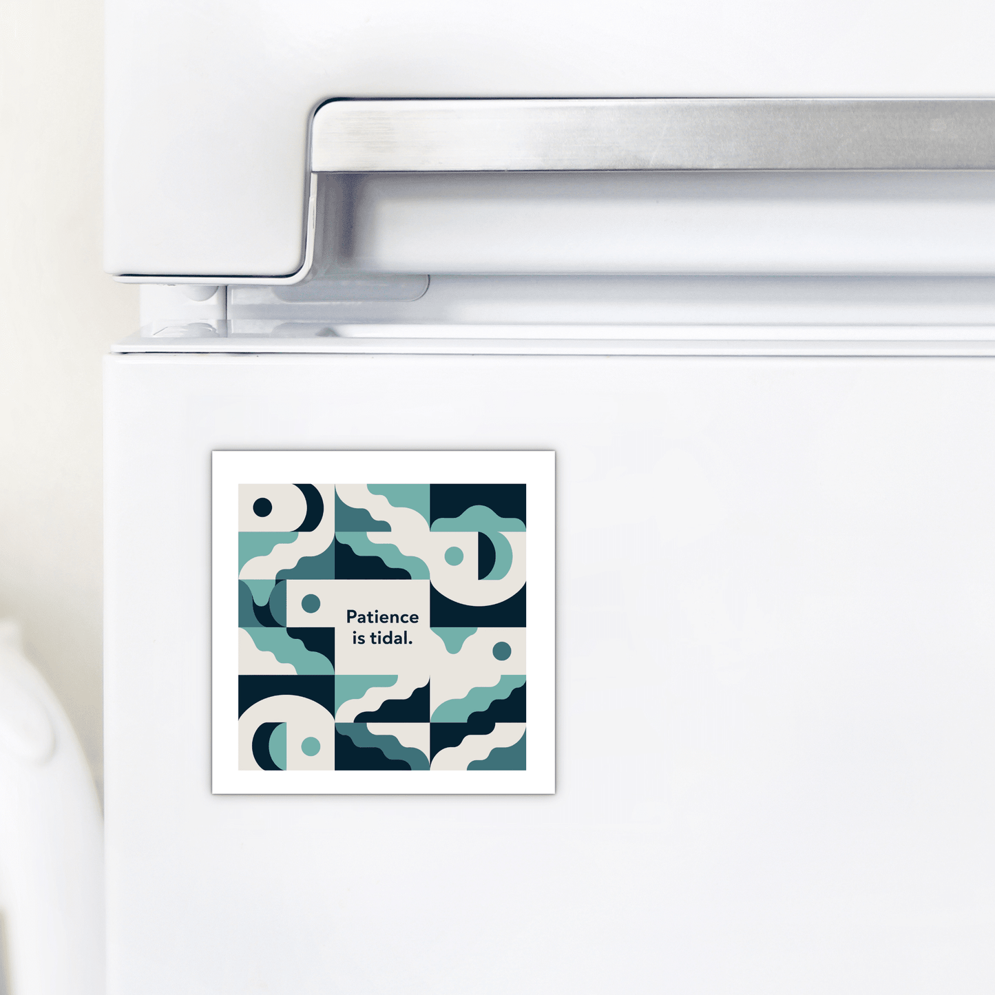 The Patience Is Tidal Magnet – Ocean-Inspired Calm Quote by Mirabilia Boutique, featuring abstract blue, teal, and white wave patterns with the phrase “Patience is tidal,” is attached to a white refrigerator door.