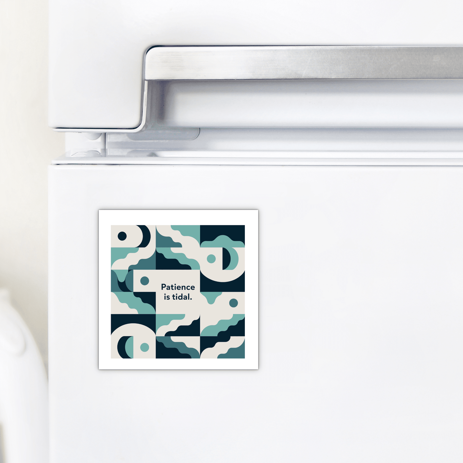 The Patience Is Tidal Magnet – Ocean-Inspired Calm Quote by Mirabilia Boutique, featuring abstract blue, teal, and white wave patterns with the phrase “Patience is tidal,” is attached to a white refrigerator door.