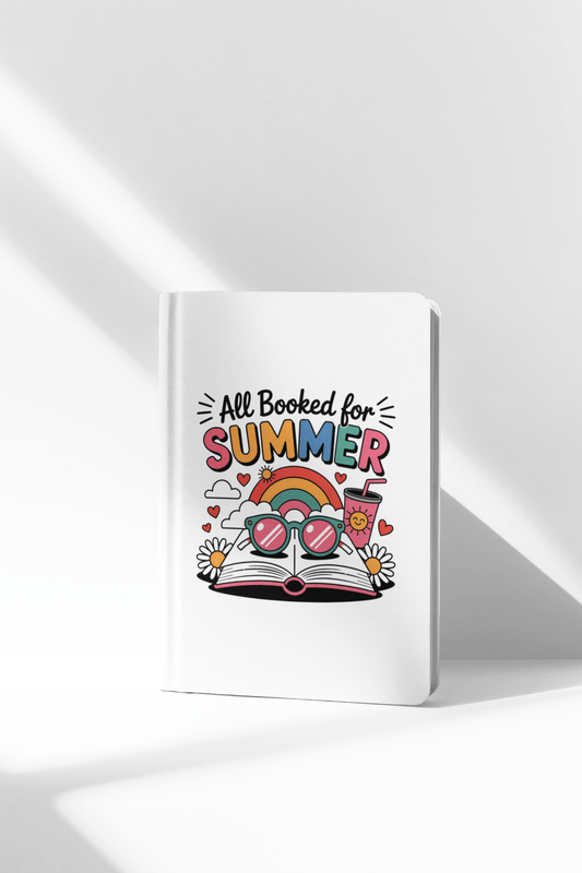 The "All Booked for Summer Journal" by Mirabilia Boutique features a vibrant cover with sunglasses, rainbow, sun, and flowers atop an open book—the perfect fun reading gift for bookworms and cute summer stationery lovers.