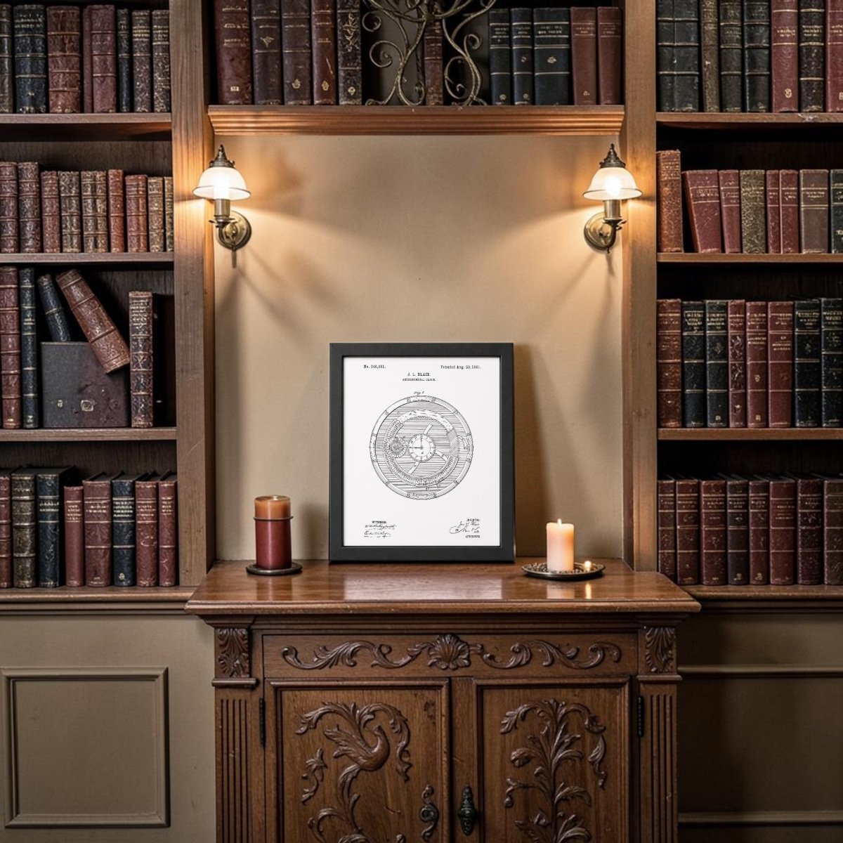 The Astronomical Clock Patent Art Print by Mirabilia Boutique sits framed on a carved wooden cabinet between two lit wall lamps, surrounded by shelves of old books, with a tall and a short candle beside the artwork.