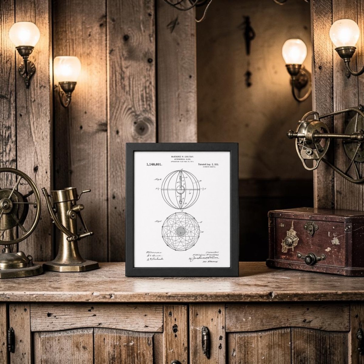 The Mirabilia Boutique Astronomical Globe Patent Art Print rests on a rustic wooden cabinet, surrounded by brass instruments, an old wooden box, and glowing wall-mounted bulbs on a wood-paneled wall.