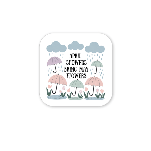 The Mirabilia Boutique April Showers Bring May Flowers Magnet features a pastel illustration with clouds, raindrops, umbrellas, flowers, and puddles—perfect for adding a touch of spring to your fridge or any space!.
