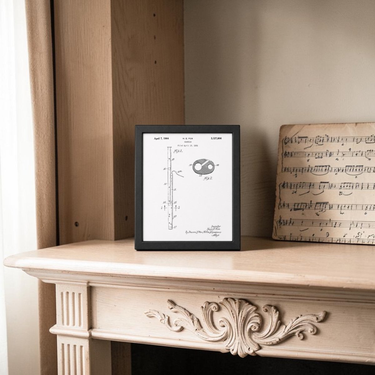 The Bassoon Patent Print on Metal Wall Art by Mirabilia Boutique sits on a wooden mantel beside sheet music, adding a cozy touch to the softly lit, neutral room—an ideal way to display unique bassoon-themed decor.