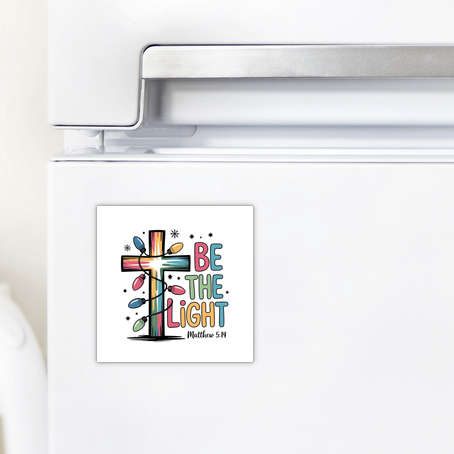 The Be the Light Magnet by Mirabilia Boutique features “Be the Light” and Matthew 5:14—ideal for Christian fridge decor, stocking stuffers, or faith-based gifts.