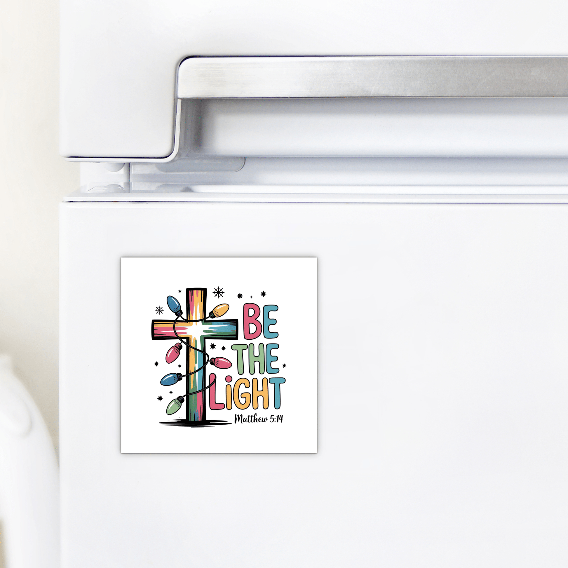 The Be the Light Magnet by Mirabilia Boutique features “Be the Light” and Matthew 5:14—ideal for Christian fridge decor, stocking stuffers, or faith-based gifts.