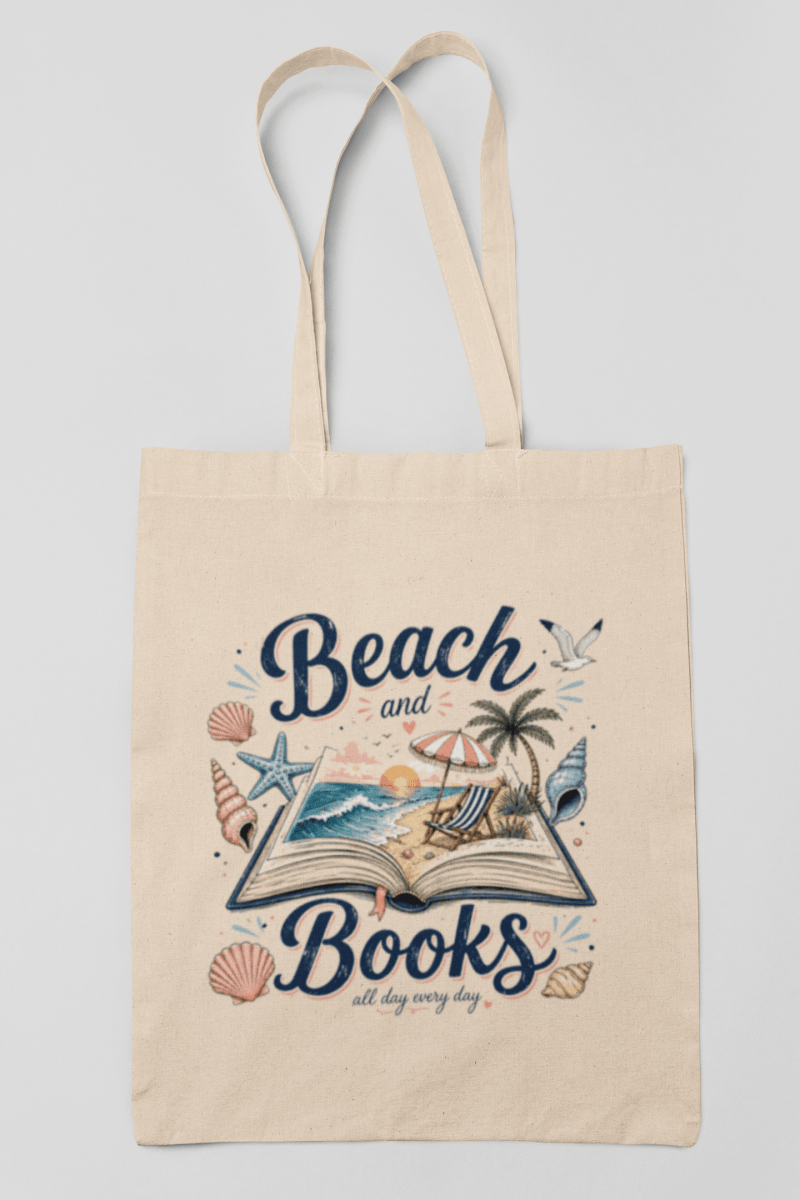 The Beach and Books Canvas Tote Bag by Mirabilia Boutique is a beige canvas bag featuring an open book with a beach scene—palm tree, seagull, starfish, and seashells. Perfect for anyone who loves books and the beach all day, every day.