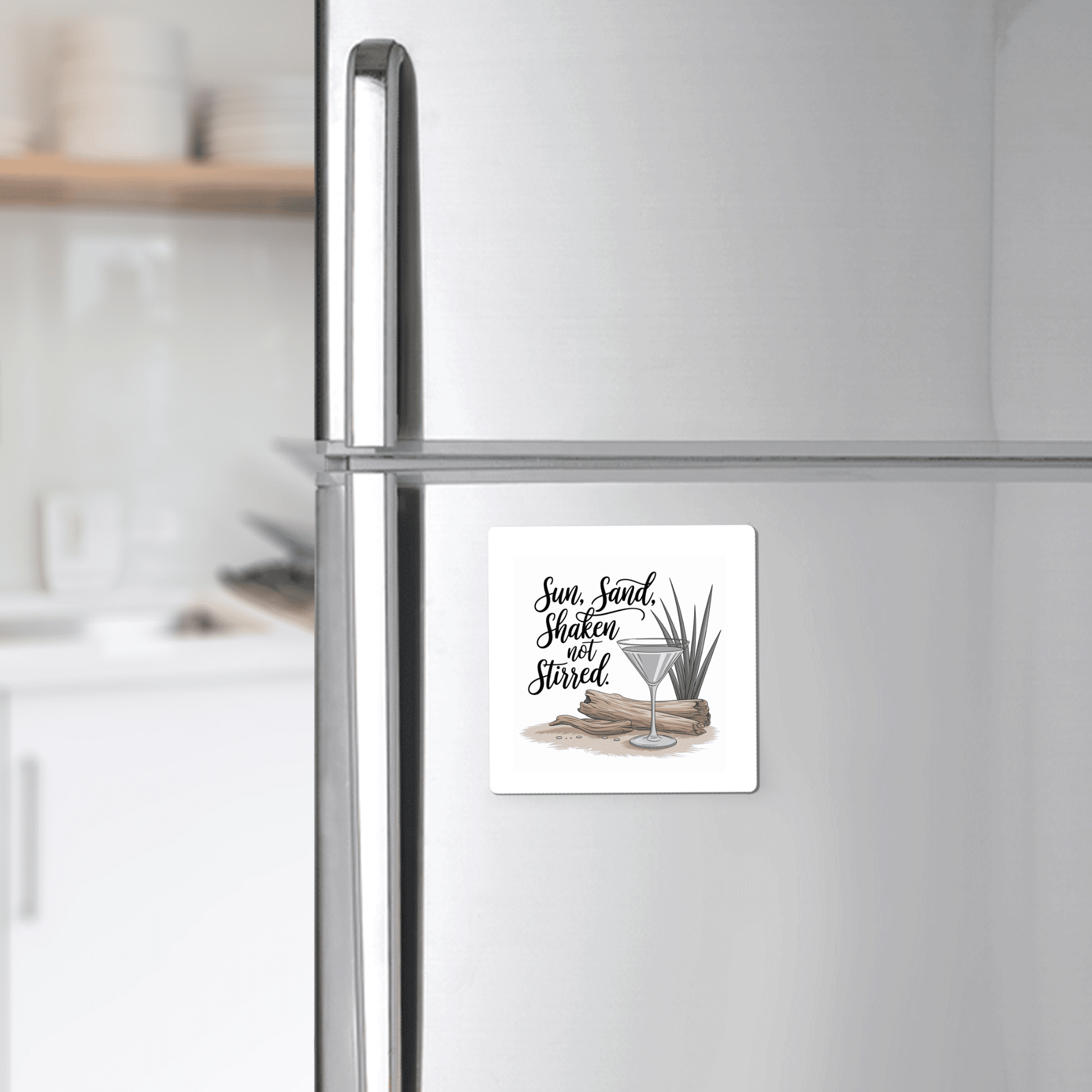 The Sun, Sand, Shaken Not Stirred Magnet by Mirabilia Boutique adds a touch of coastal charm and cocktail-inspired decor to your kitchen.