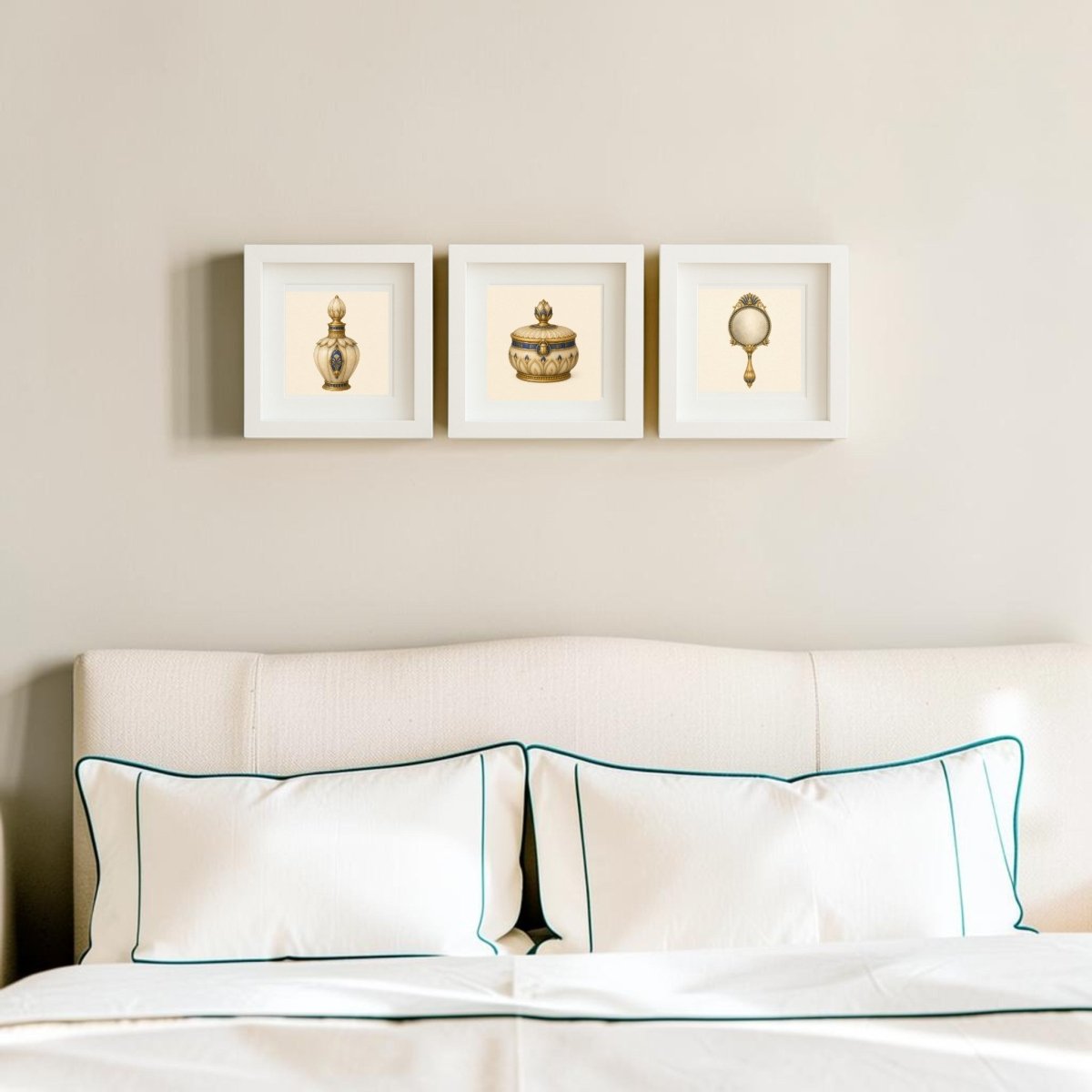 A neatly made bed with white pillows and bedding sits below three framed canvas artworks from Mirabilia Boutique—titled “Beauty Rituals of the Nile Relics | Mirabilia Relics”—featuring vintage object prints reminiscent of Nile relics, hanging on a beige wall.