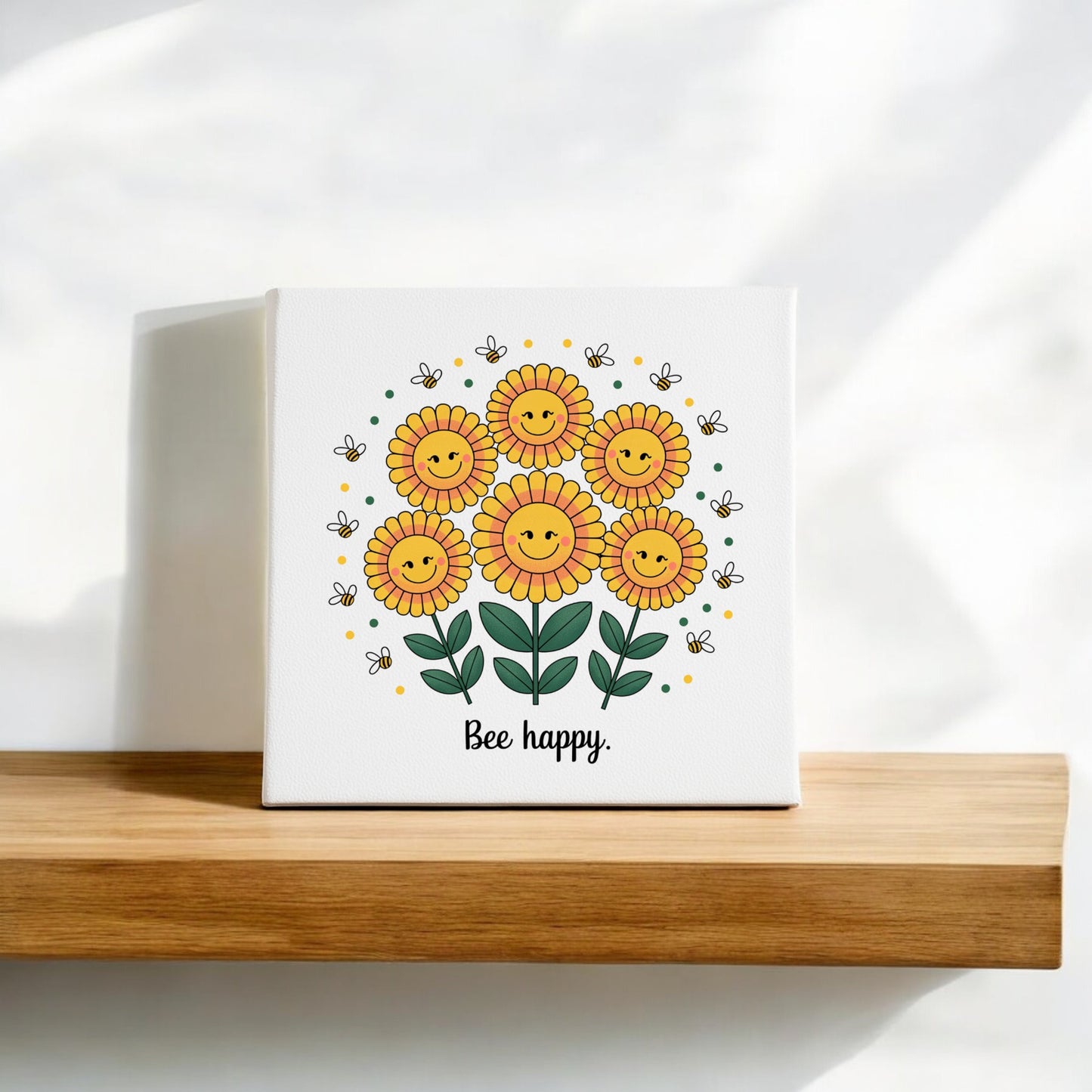 The "Bee Happy Canvas – Smiling Sunflowers & Summer Joy" by Mirabilia Boutique features six smiling sunflowers and buzzing bees with "Bee happy" below, making it perfect summer decor for your home.