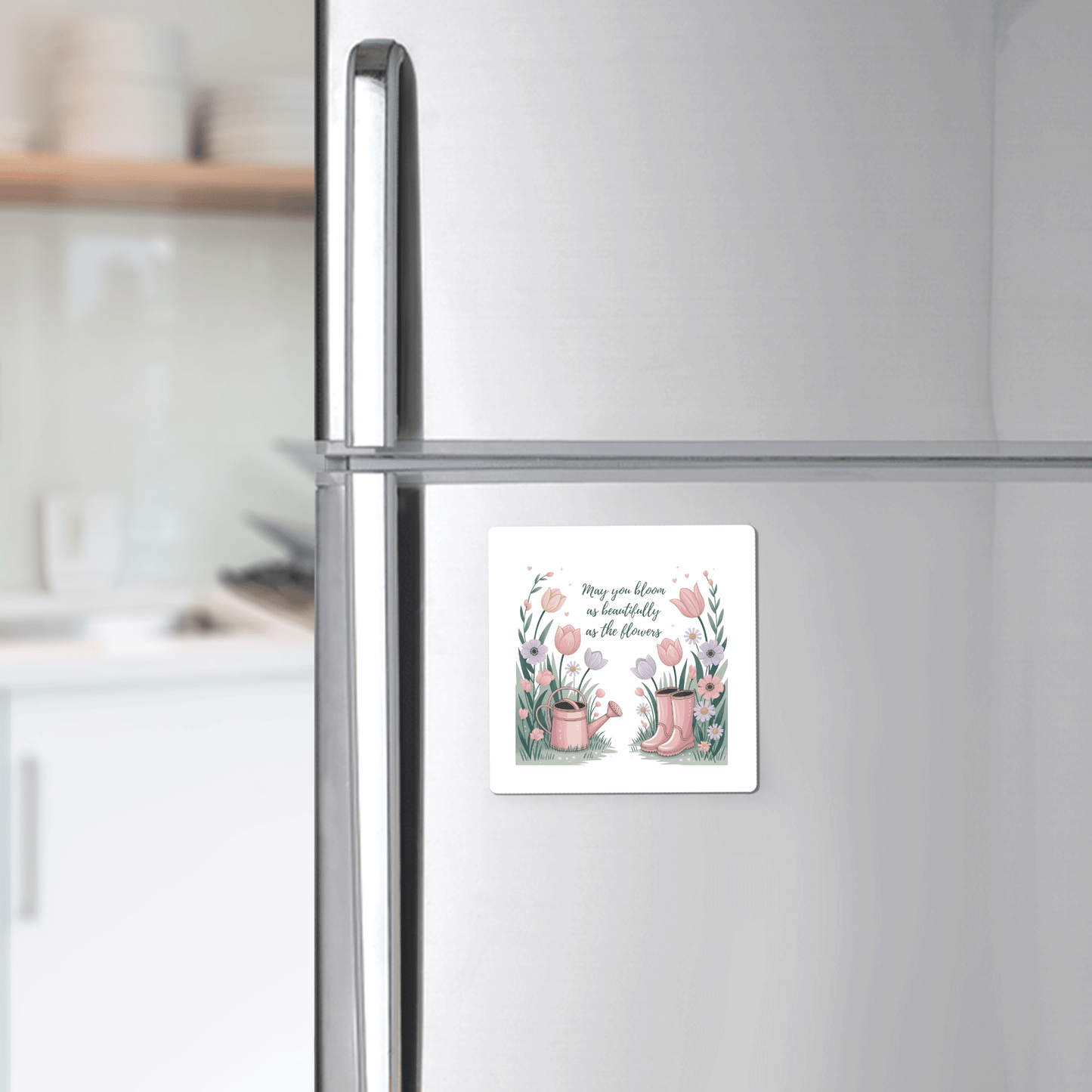 Add charm to your fridge with the Mirabilia Boutique Bloom Like the Flowers Magnet – Spring Floral Quote. Featuring pink gardening tools and flowers, it’s a perfect encouragement gift that reads, "May you live as beautifully as the flowers.