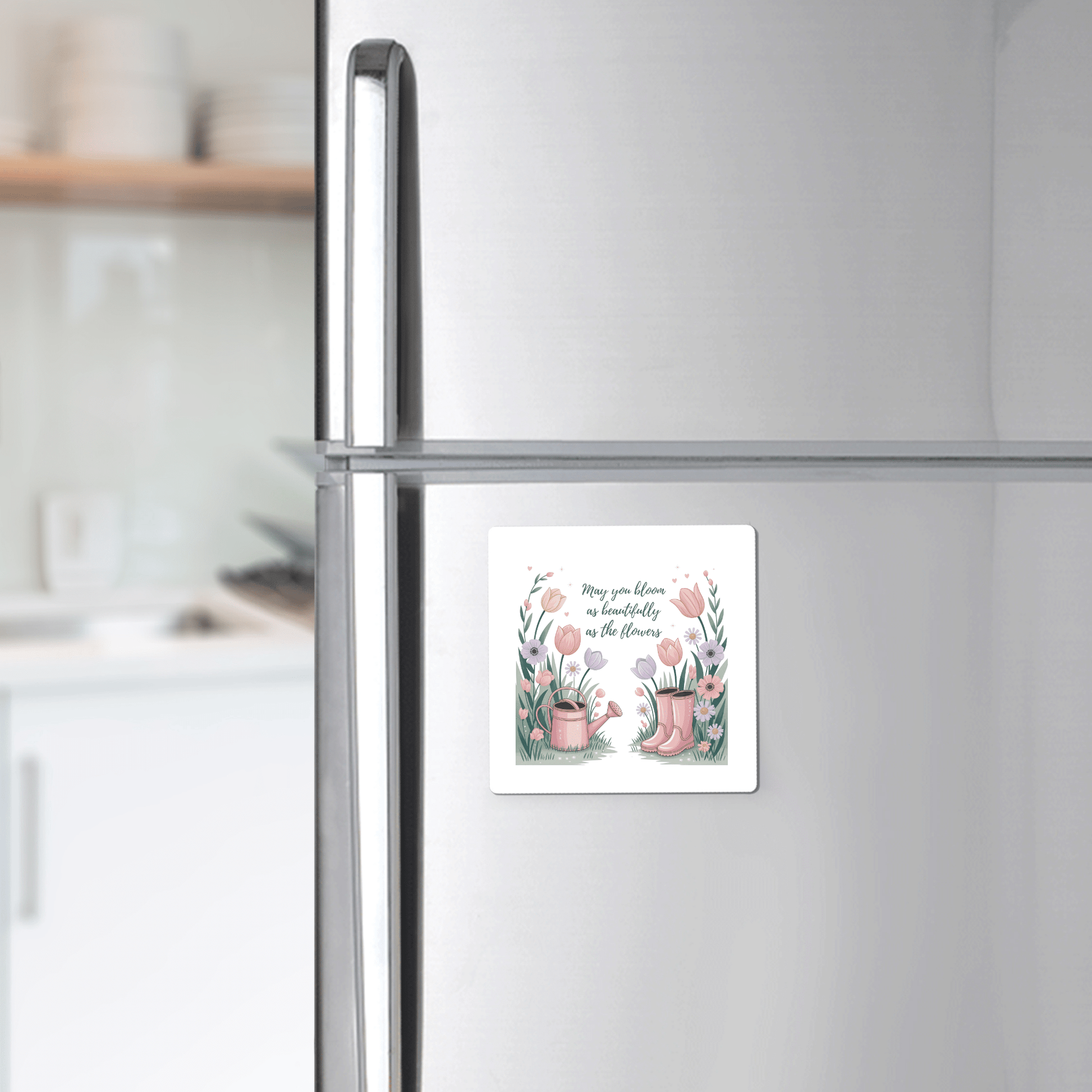 Add charm to your fridge with the Mirabilia Boutique Bloom Like the Flowers Magnet – Spring Floral Quote. Featuring pink gardening tools and flowers, it’s a perfect encouragement gift that reads, "May you live as beautifully as the flowers.