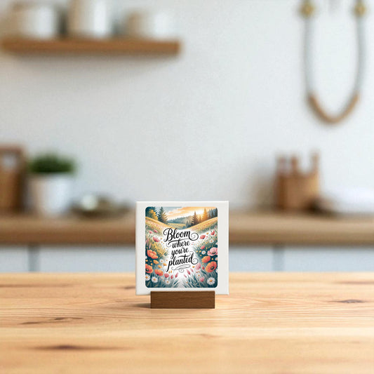 The Bloom Where You’re Planted Canvas | Mini Wildflower Art by Mirabilia Boutique stands on a wooden base, displaying its uplifting message and colorful blooms—perfect for adding cheerful charm to any kitchen counter.