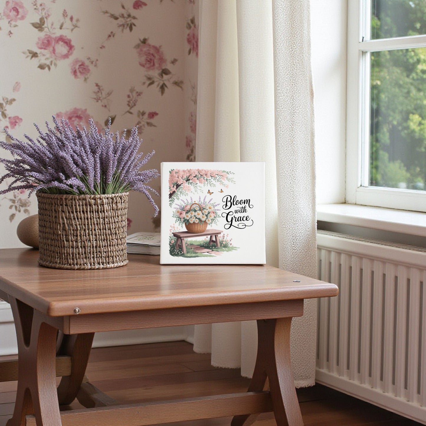 A softly lit room with rose-patterned wallpaper features botanical decor and the Mirabilia Boutique "Bloom with Grace Floral Canvas Wall Art," alongside a small wooden table with a potted lavender plant by the window.