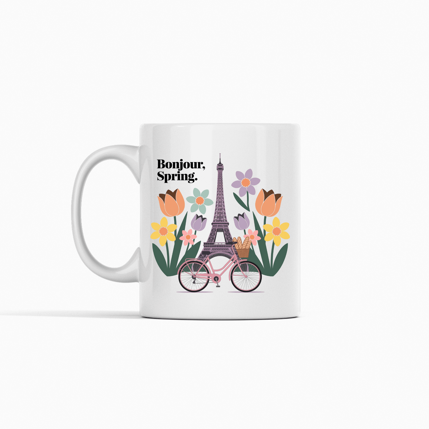 Enjoy your favorite drink in the "Bonjour Spring Paris Mug – Eiffel Tower & Florals" by Mirabilia Boutique, featuring Parisian charm with the Eiffel Tower, florals, a bicycle with baguettes, and "Bonjour, Spring.